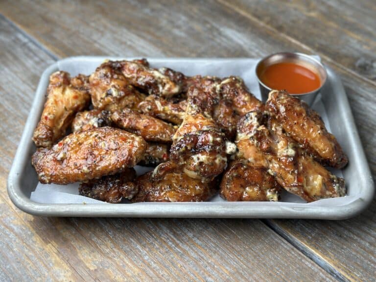 Garlic parmesan wings on a tray