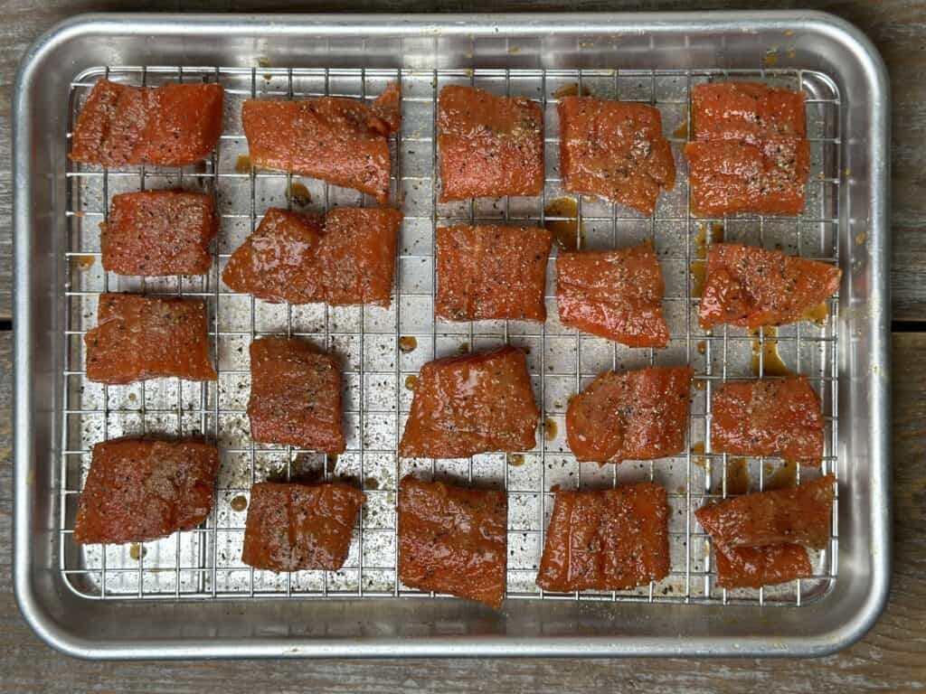 Salmon pieces on a wire rack