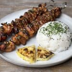 Grilled Huli Huli Chicken Skewers on a plate