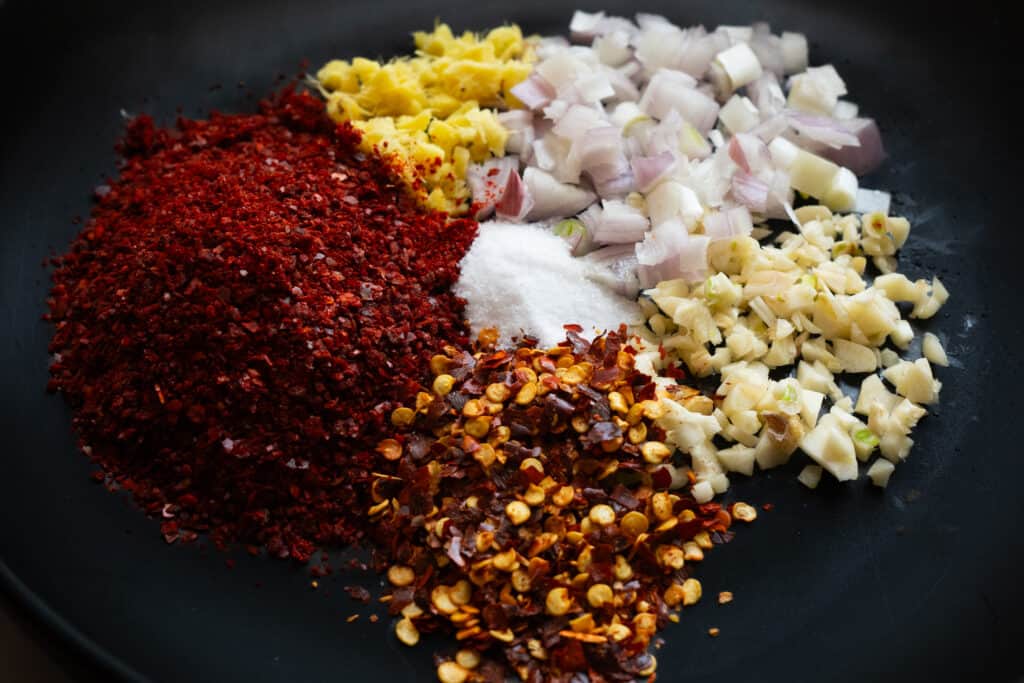 chili garlic oil ingredients in a bowl