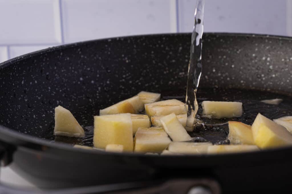 apples cooking in a skillet