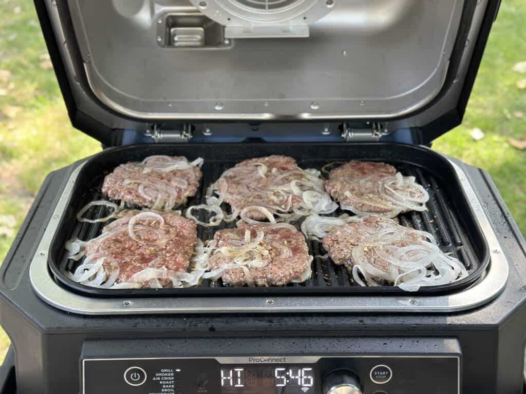 smash burgers on the grill