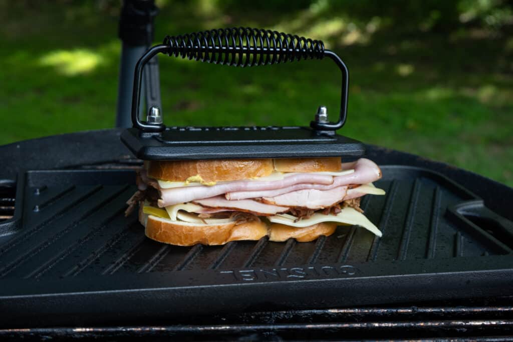 Smoked cuban sandwich on a griddle