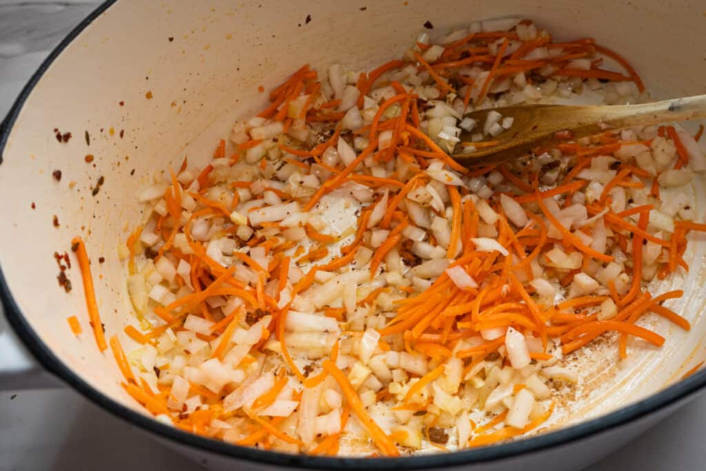 onions and carrots sautéing  