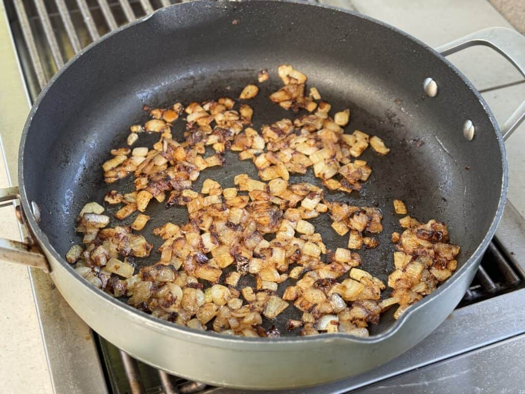 onions cooking for bacon jam