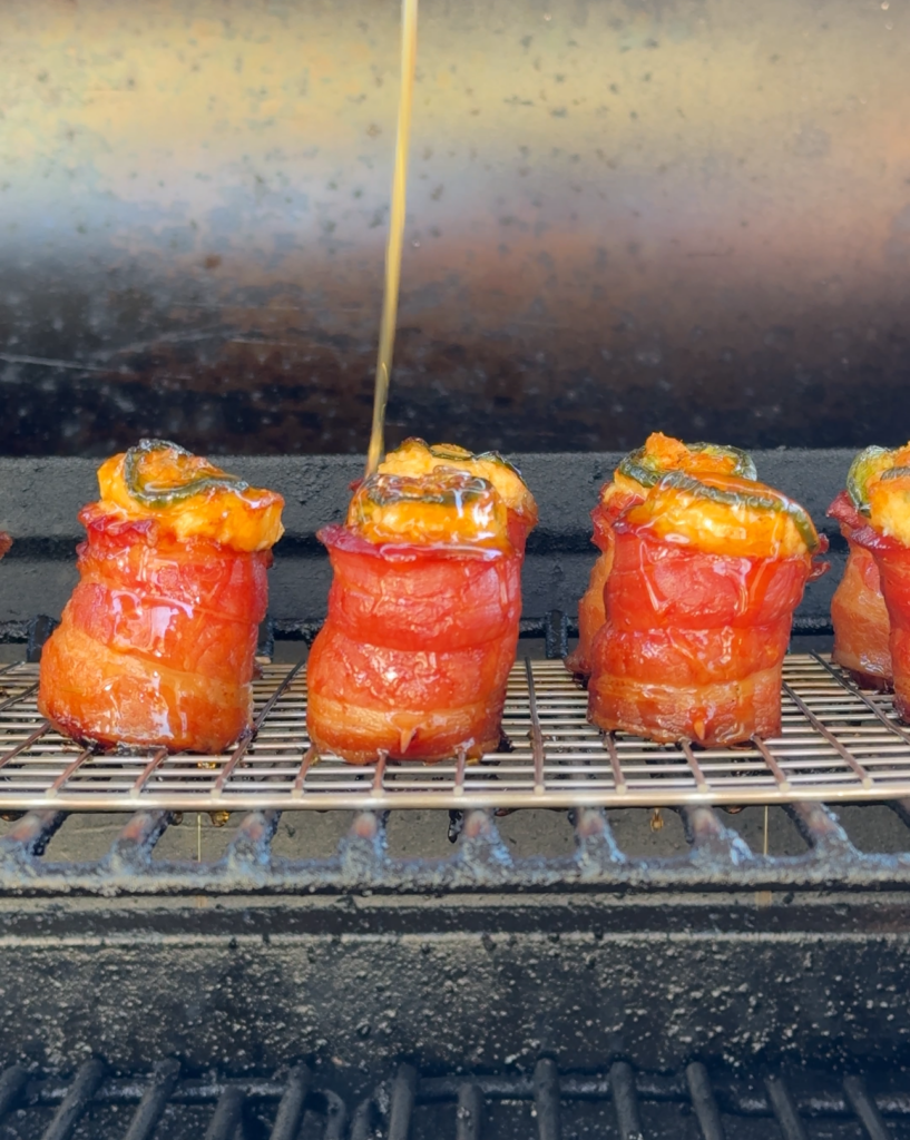 honey drizzled on smoked pig shots. 