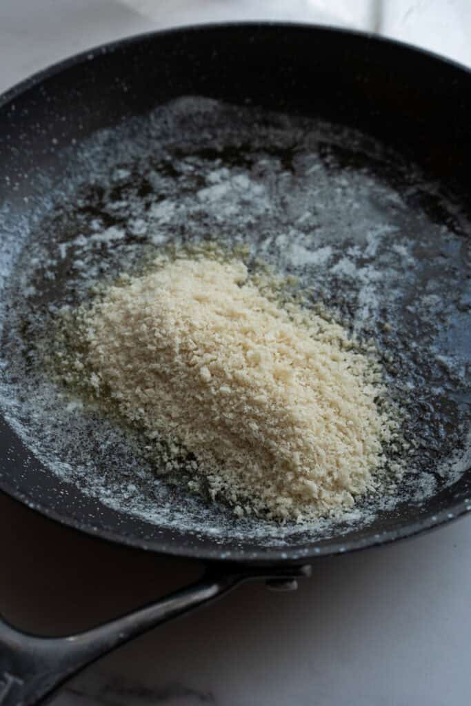 Toasting Breadcrumbs in a skillet.