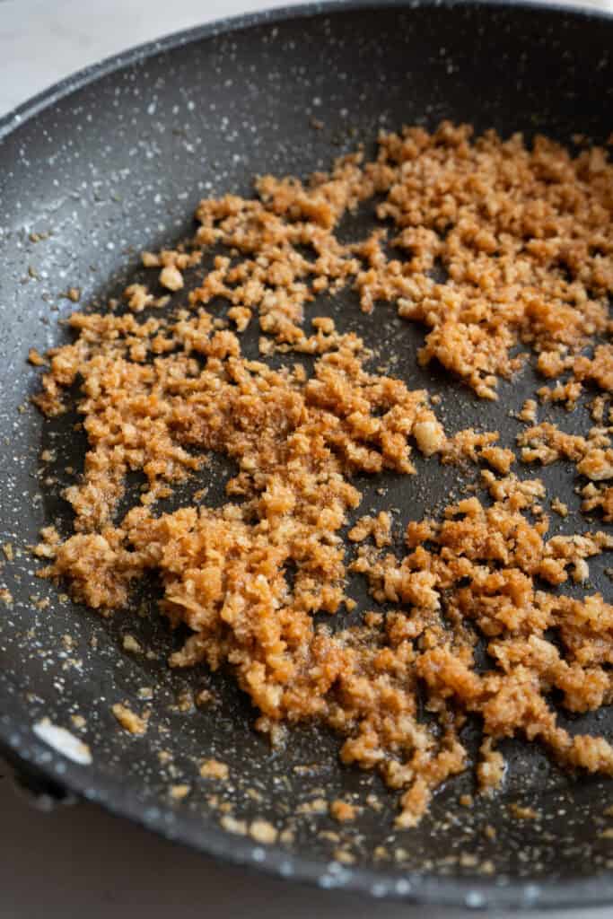 Golden brown toasted breadcrumbs.
