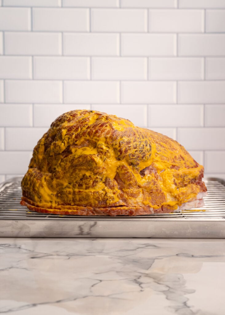 yellow mustard binder on ham