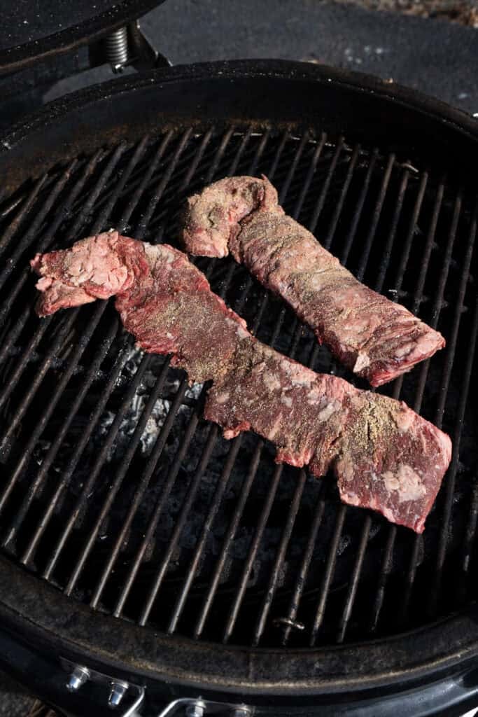 Skirt steak being grilled.