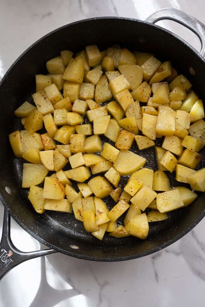 Cubed potatoes in a bowl.