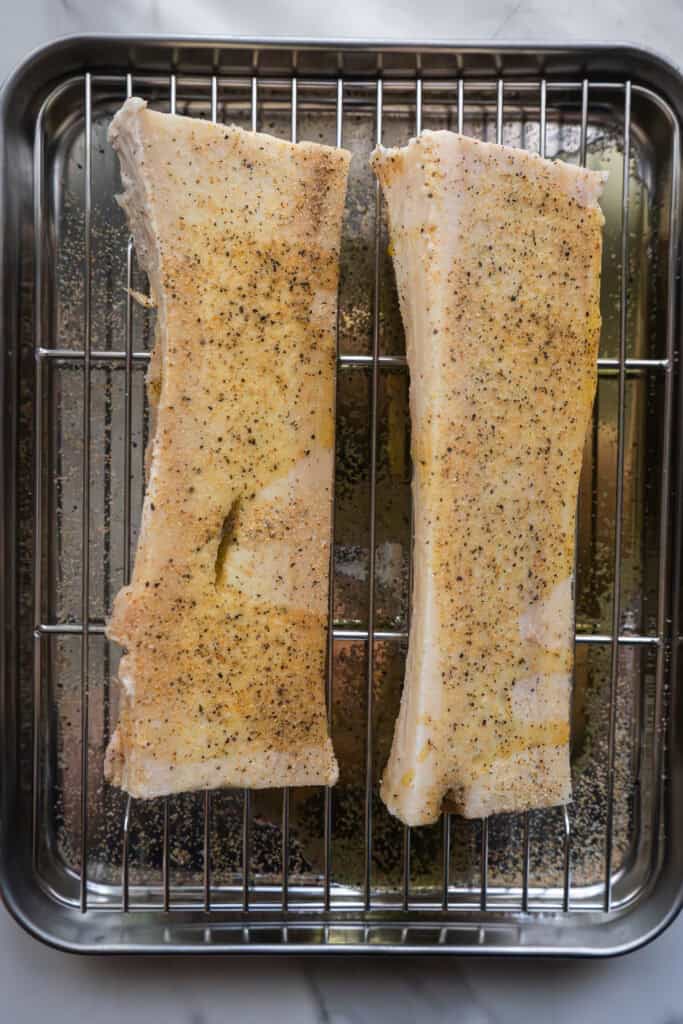 Bone marrow seasoned with salt and pepper.