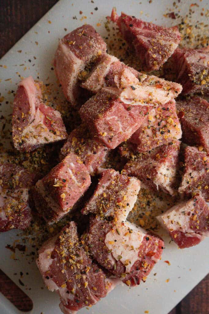 cubed and seasoned ribeye steak for steak tacos.