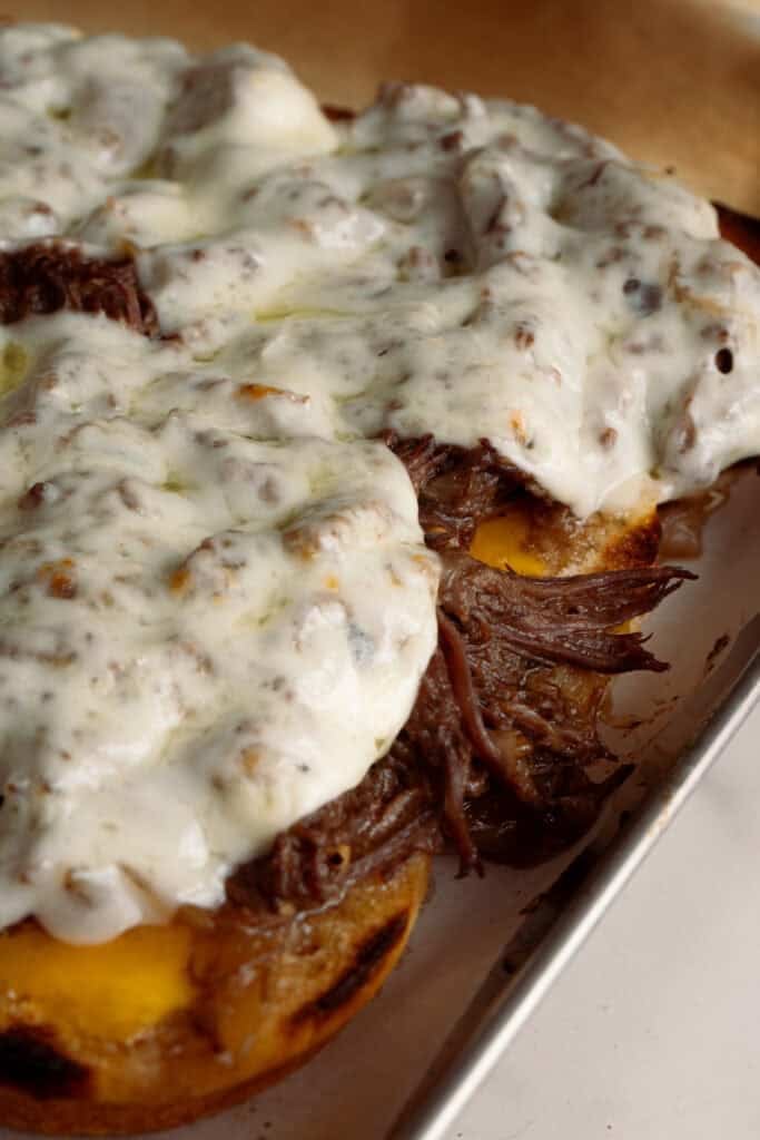 Slow cooker French dip sliders.