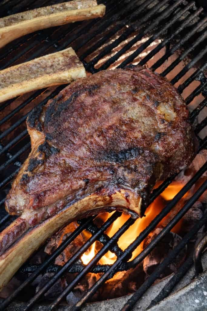 Steak being seared on the grill.