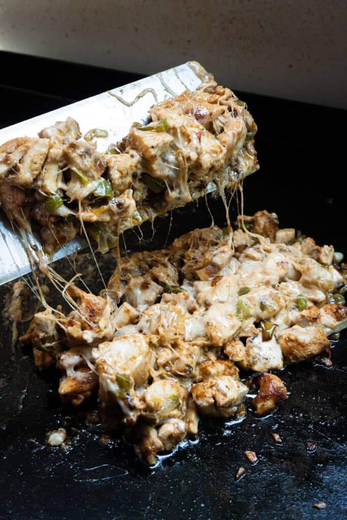 Nashville Hot Chicken on a griddle.