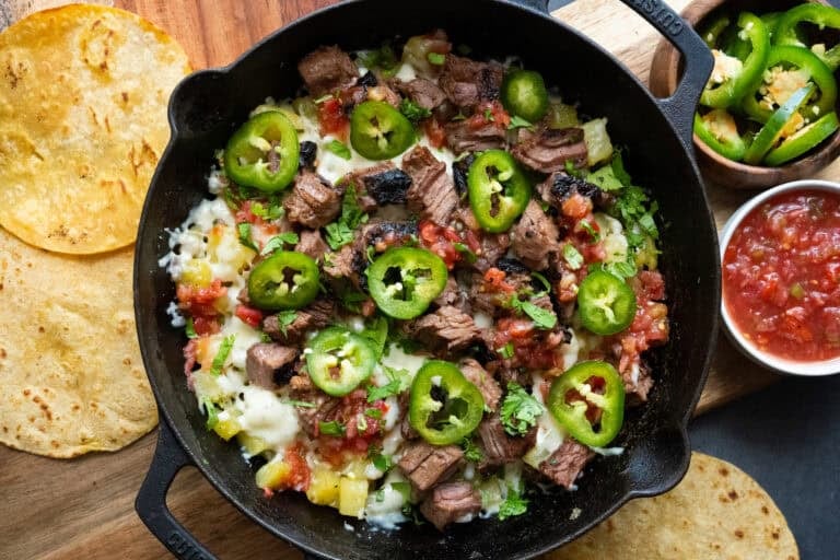 Cheesy steak skillet tacos.