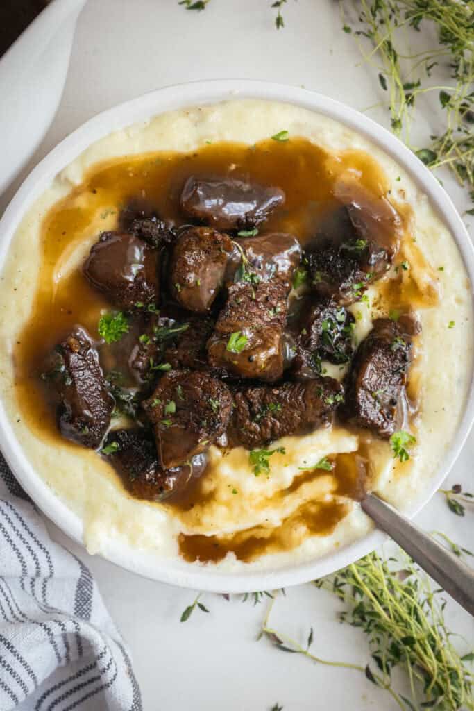 Steak bites with mashed potatoes.