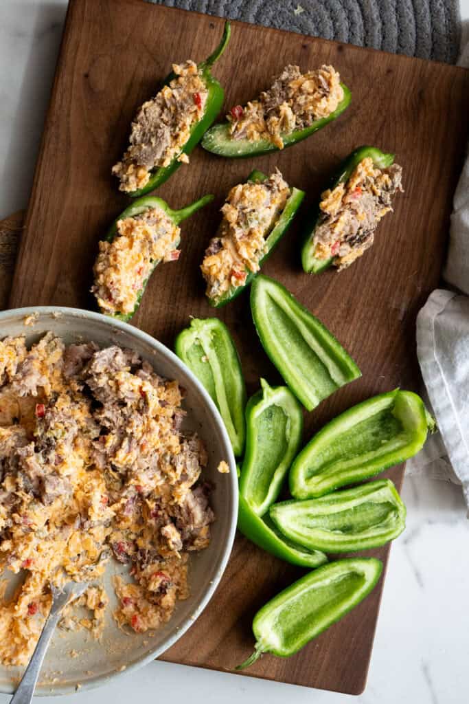 Jalapeno Peppers stuffed with brisket and pimento cheese.