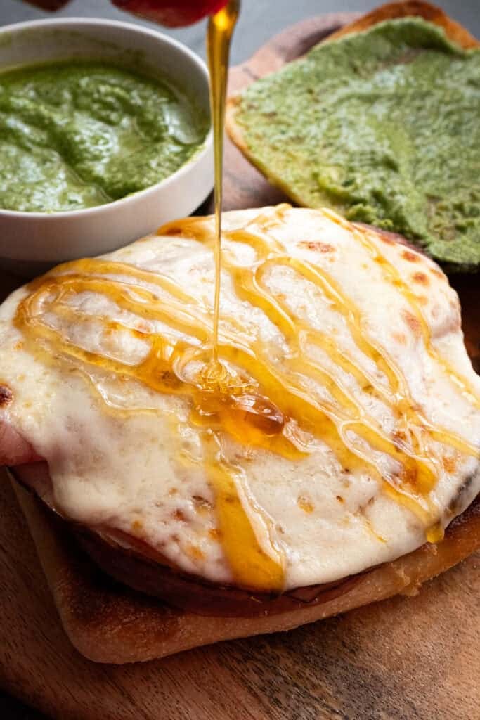 Hot Honey drizzled on a Hot Italian Pesto Sandwich.