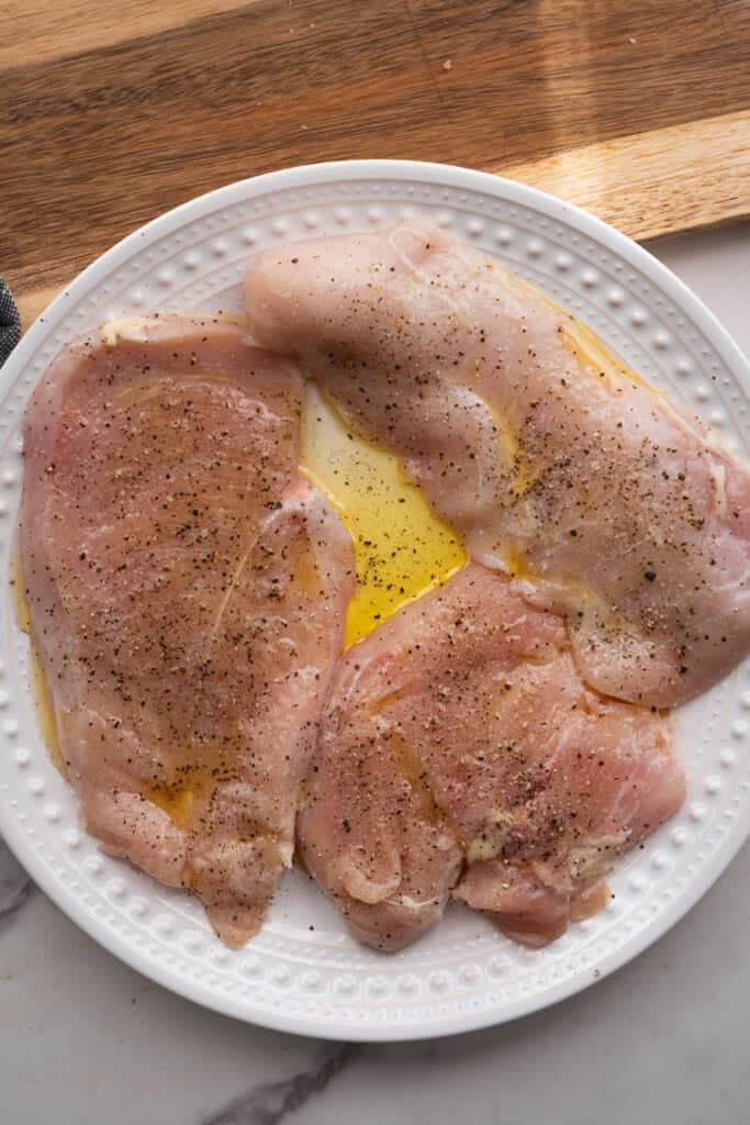 Chicken breasts seasoned with SPG.
