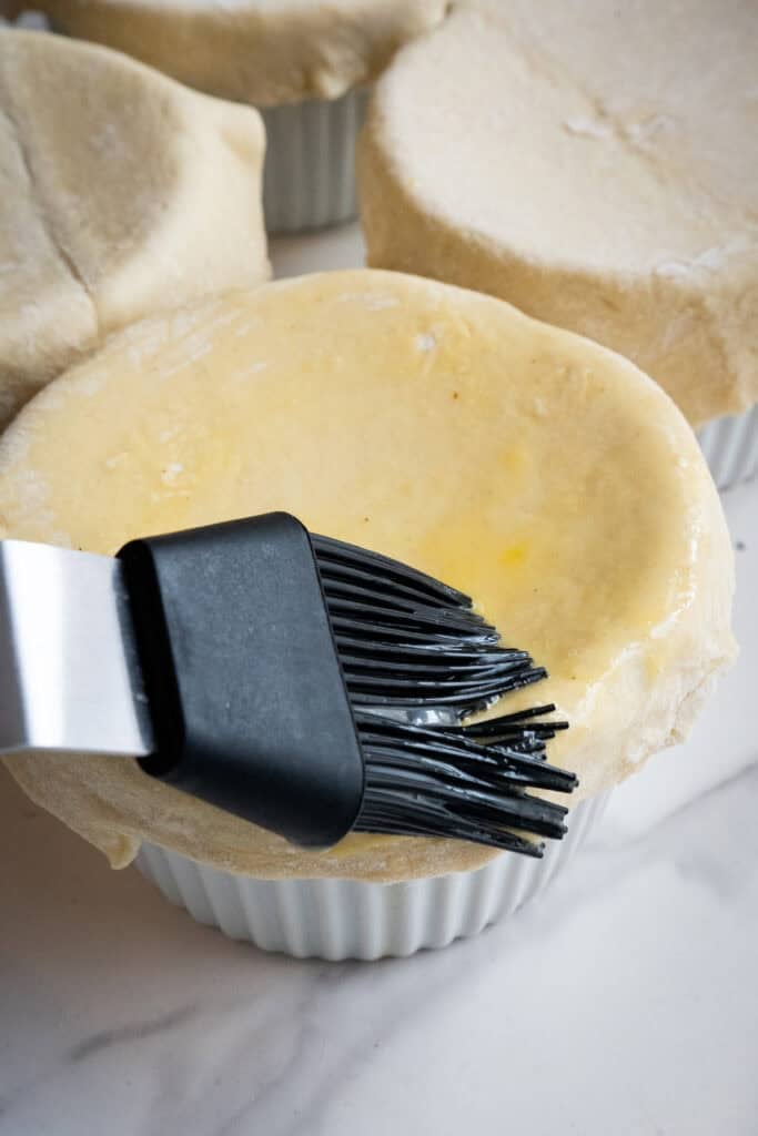 Turkey pot pie with egg wash on top.