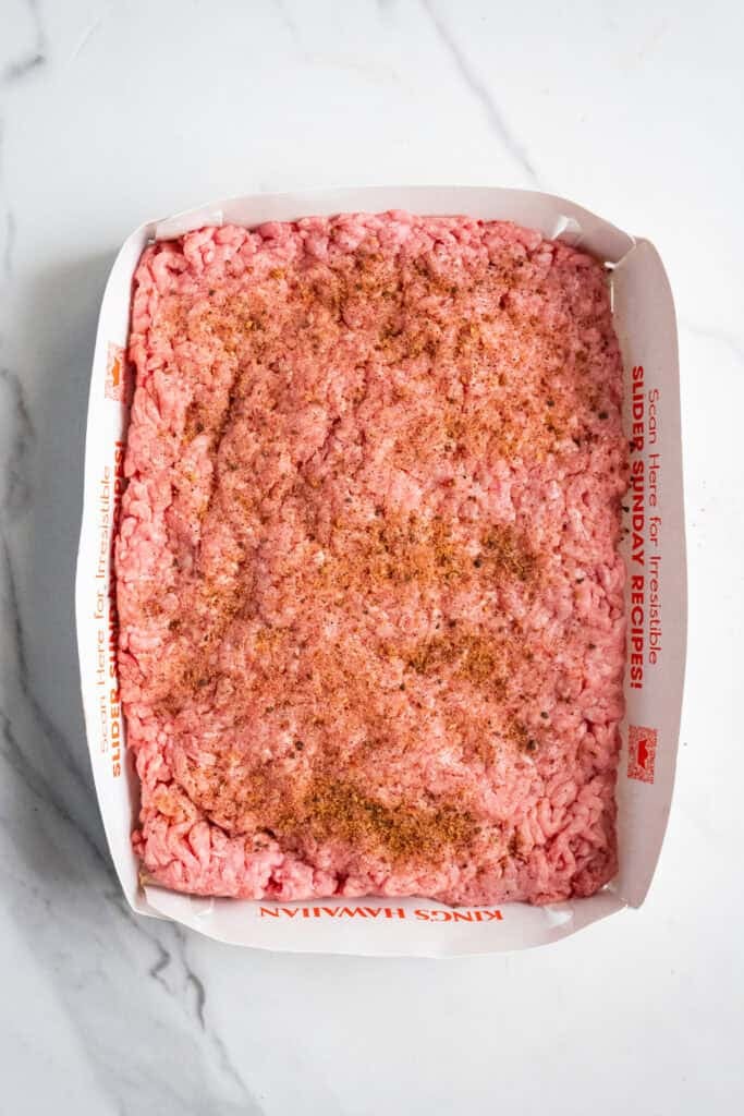 Burger stuffed into a slider tray.