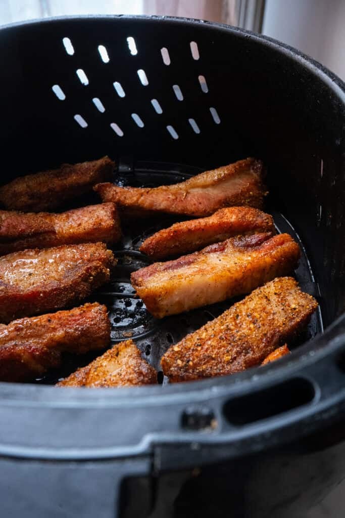 Pork belly cooking in the air fryer.