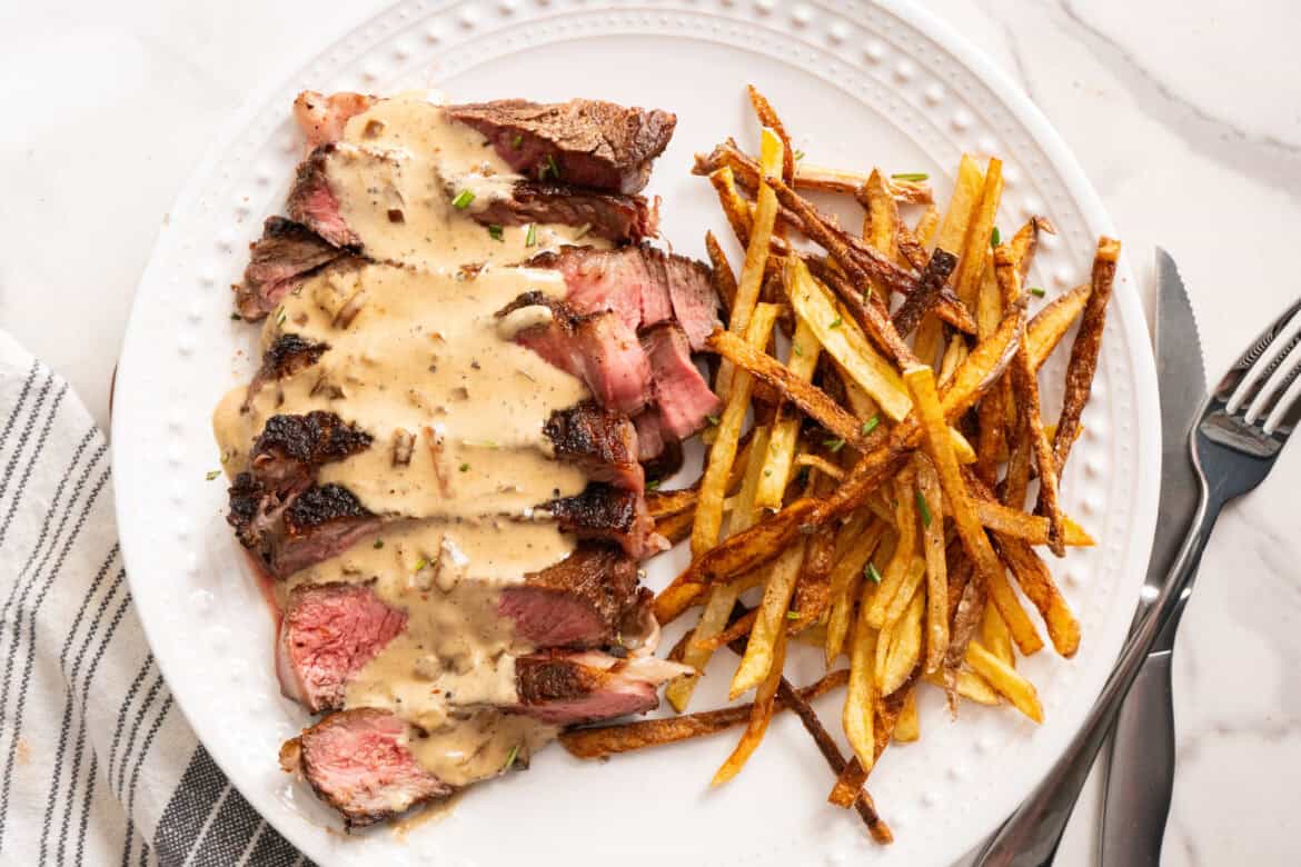 Steak with Bourbon Peppercorn Cream Sauce Steak with Bourbon Peppercorn Cream Sauce.