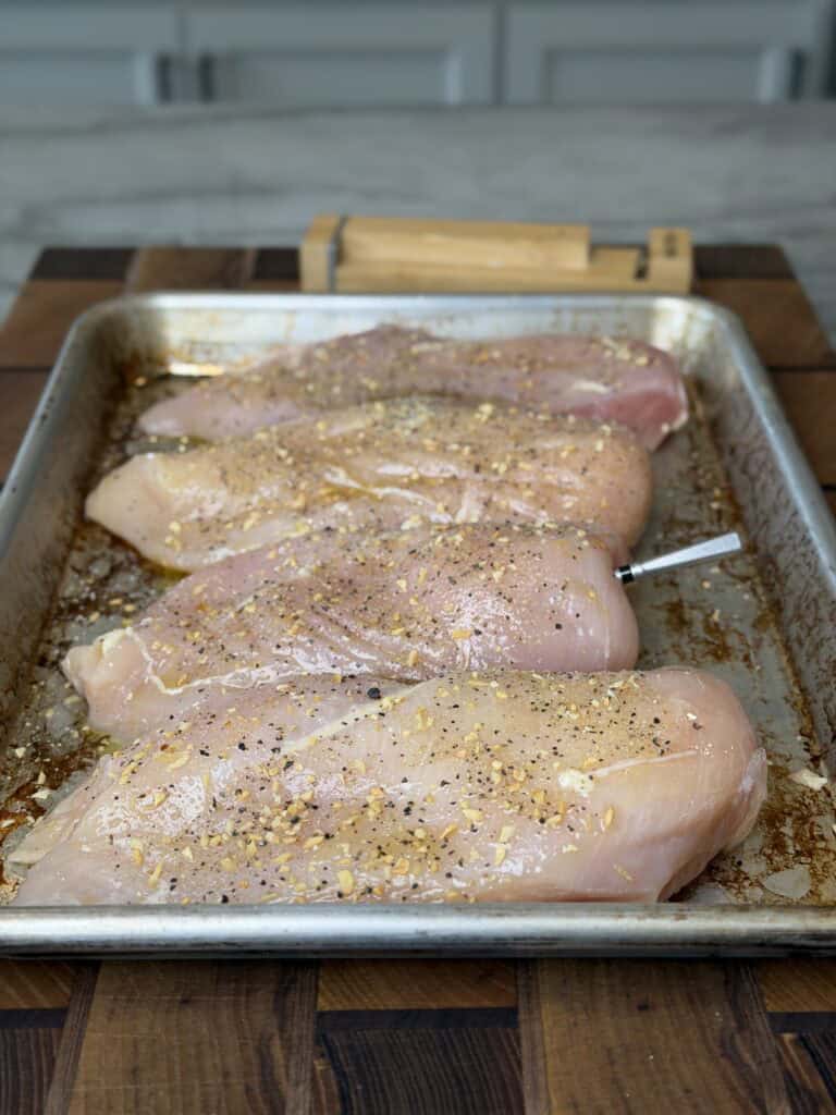 Chicken seasoned with salt, pepper garlic powder.