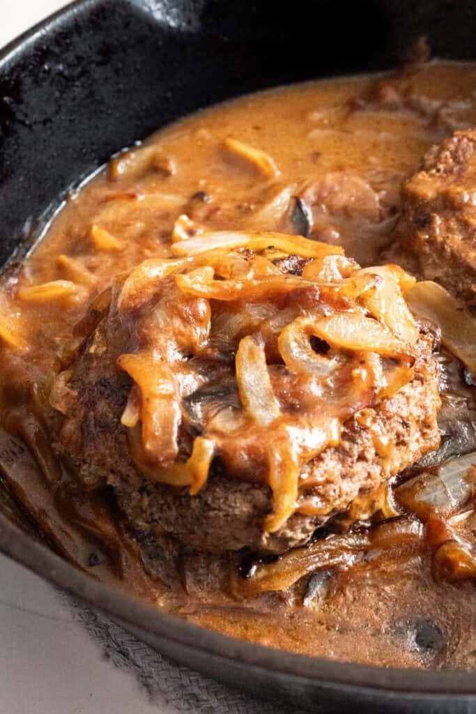 Hamburger Steaks and Gravy simmering together.