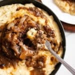 Hamburger Steaks on mashed Potatoes.