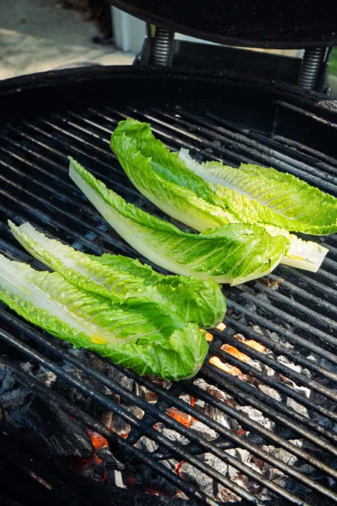 Romaine lettuce being grilled.