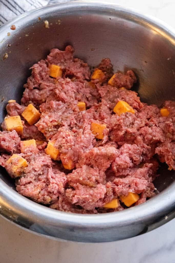 Mix burger with cheese. 