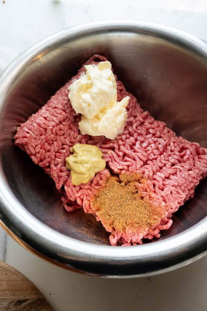 Mix burger, mayo, mustard and seasoning.