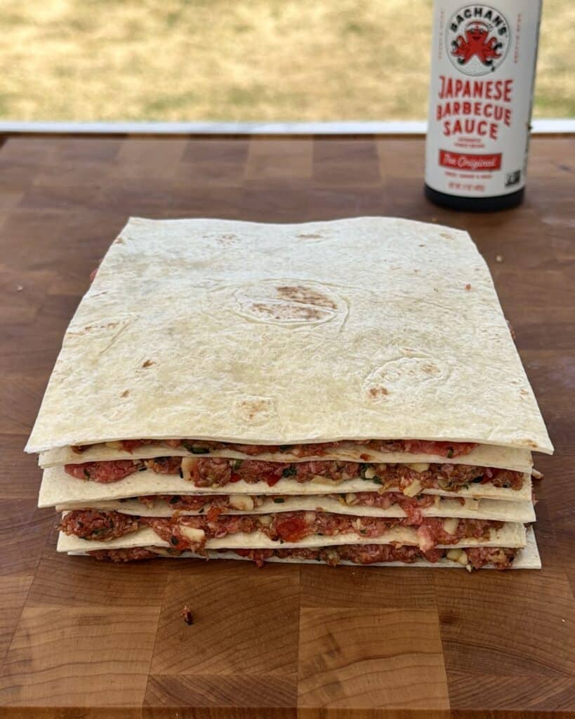 Stack layers of tortillas.