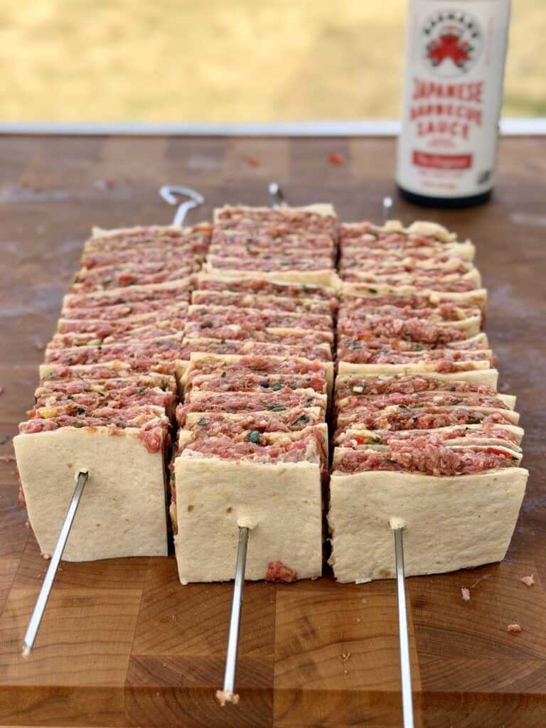 Place skewers.