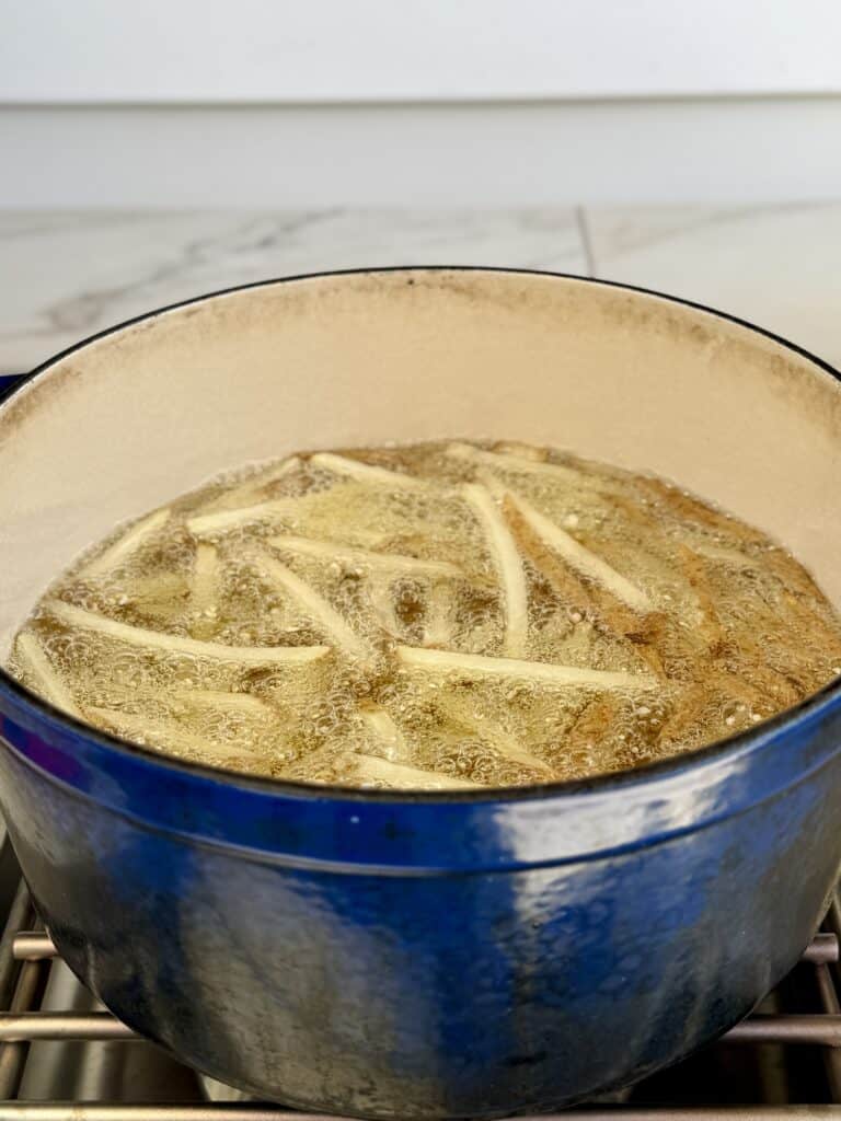 Deep fry the potatoes.