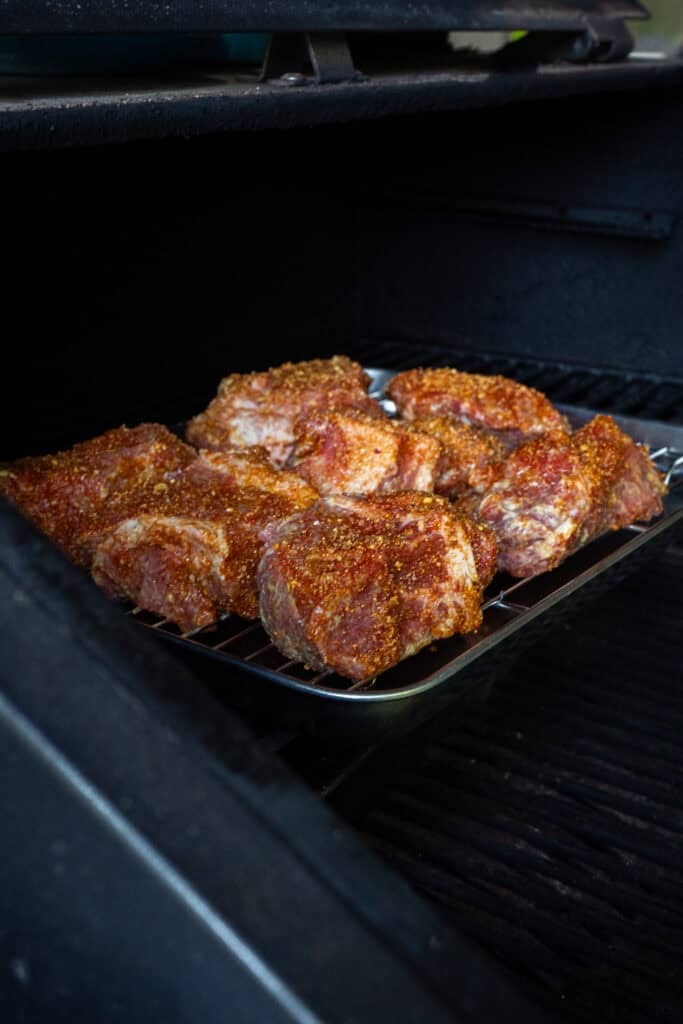 Meat going on smoker.