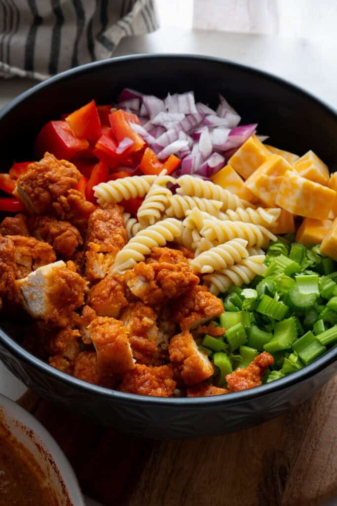 Nashville Hot Chicken Pasta Salad ingredients in bowl.