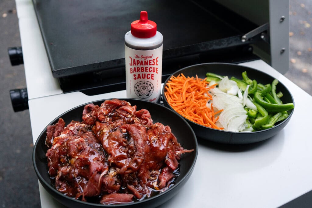 Bowl with ingredients and beef marinating.