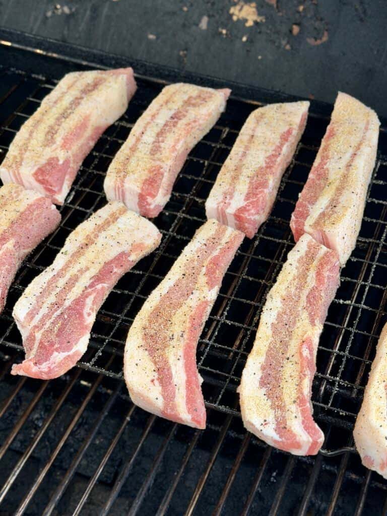 Place seasoned Pork Belly on Grill.
