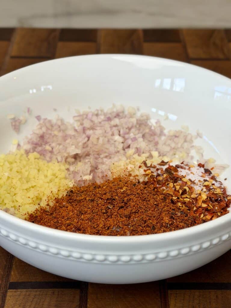 Add ingredients together in bowl.