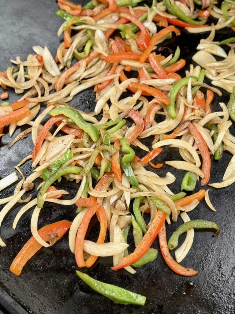 Tender peppers and onions.