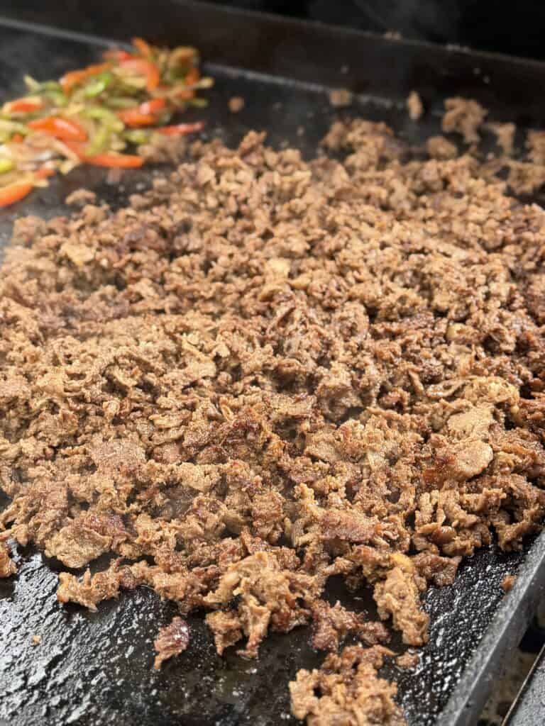Cook steak until done.