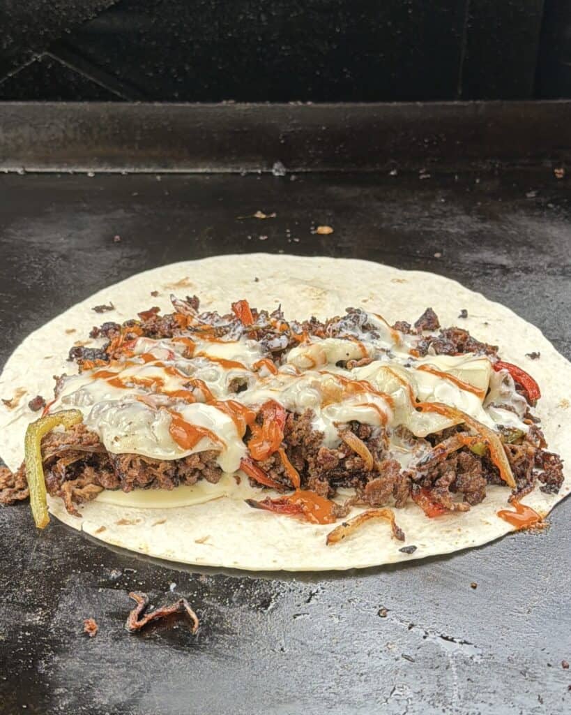 Assemble Cheesesteak Quesadillas.
