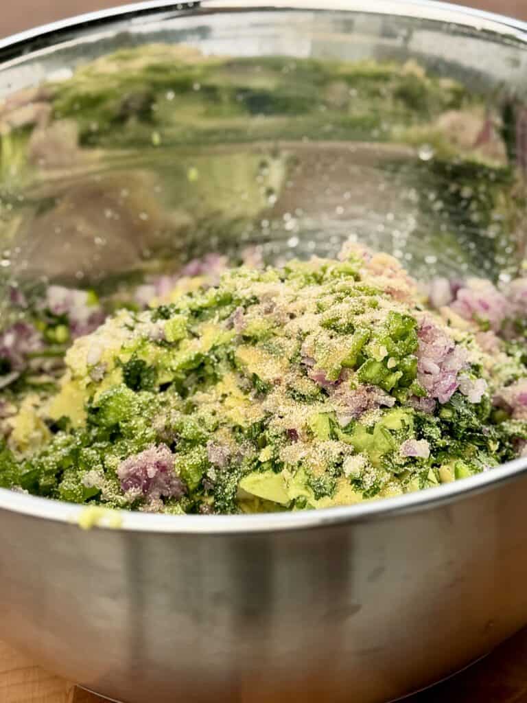 Mix Guac in medium bowl.