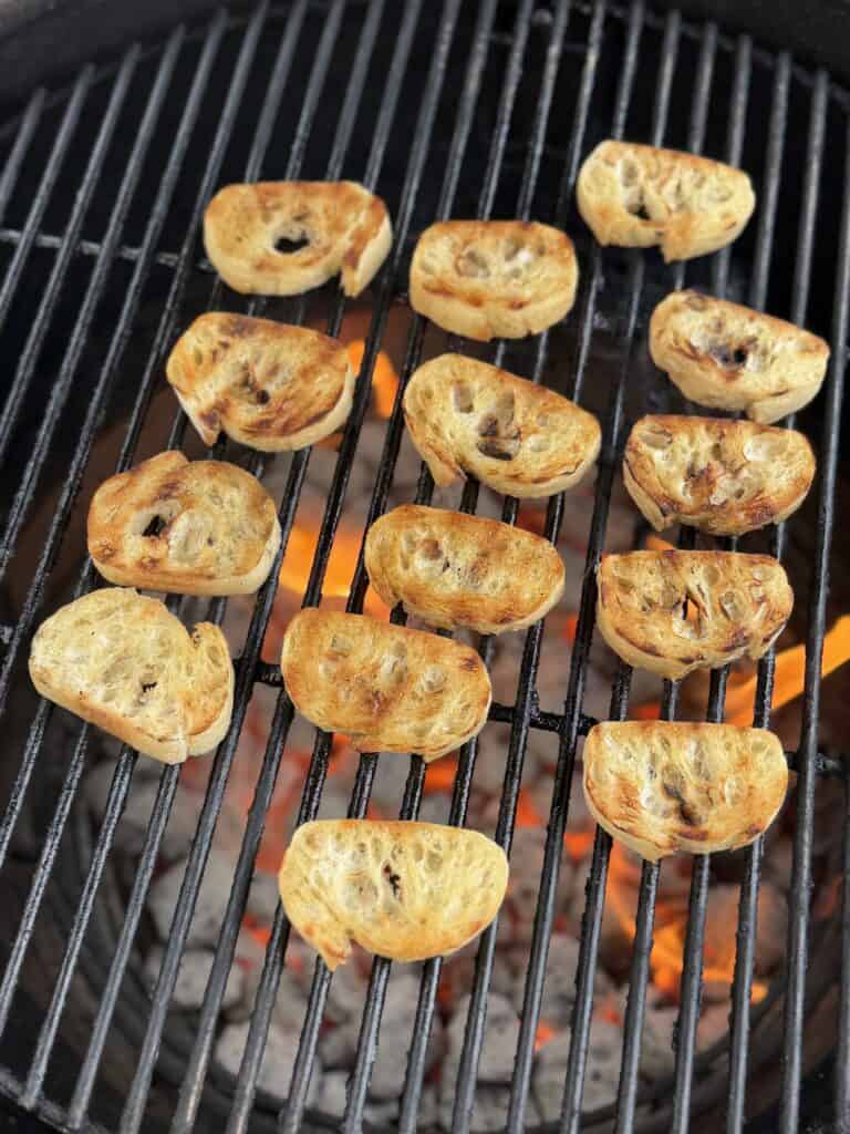 Baguettes being grilled for croutons.
