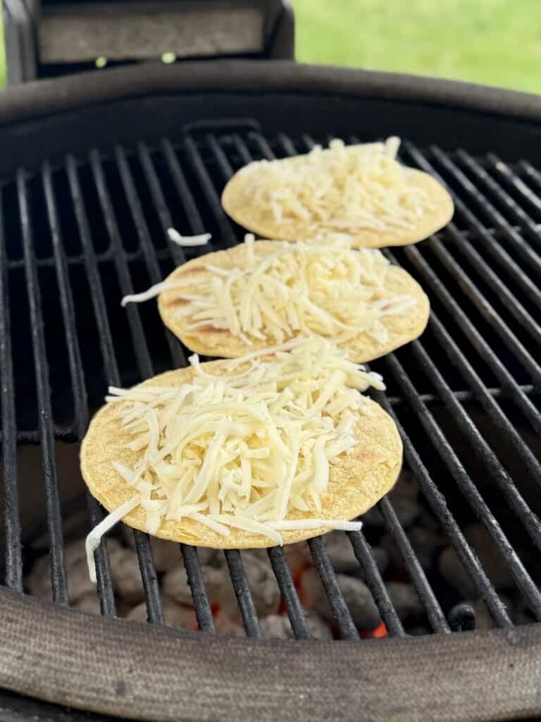 Sprinkle with cheese and grill.