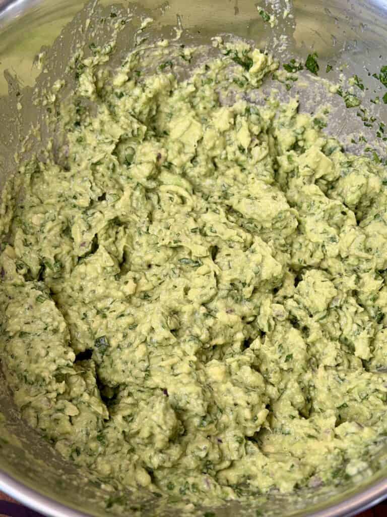 Guacamole mixed in bowl.